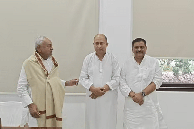 Nitish Kumar, GM Shaheen and Sanjay Jha